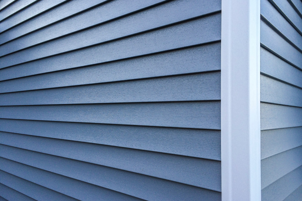 Pressure washing siding